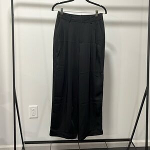 UNSPOKEN. Black trousers , size M, excellent condition.